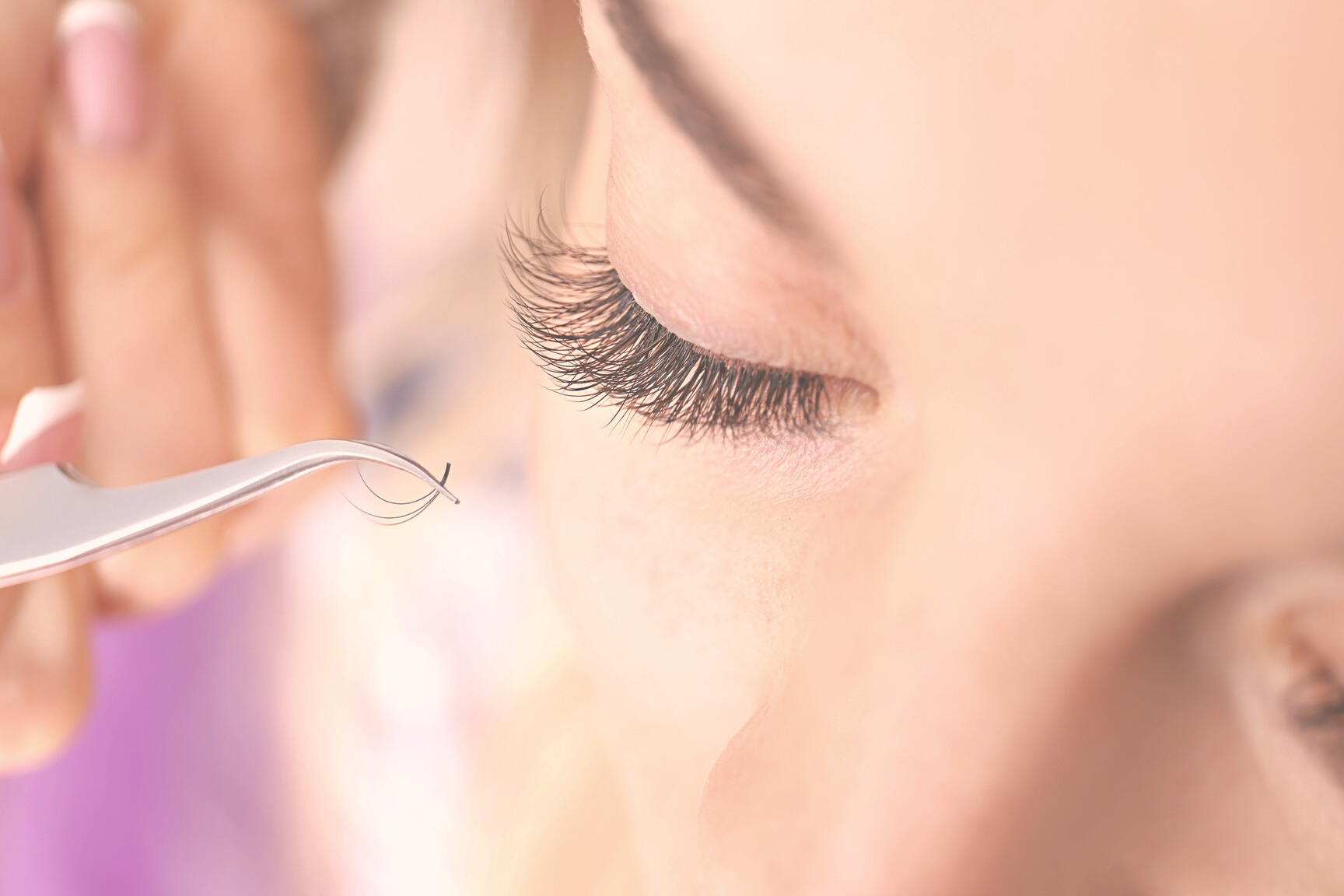 Woman Having Eyelash Extensions