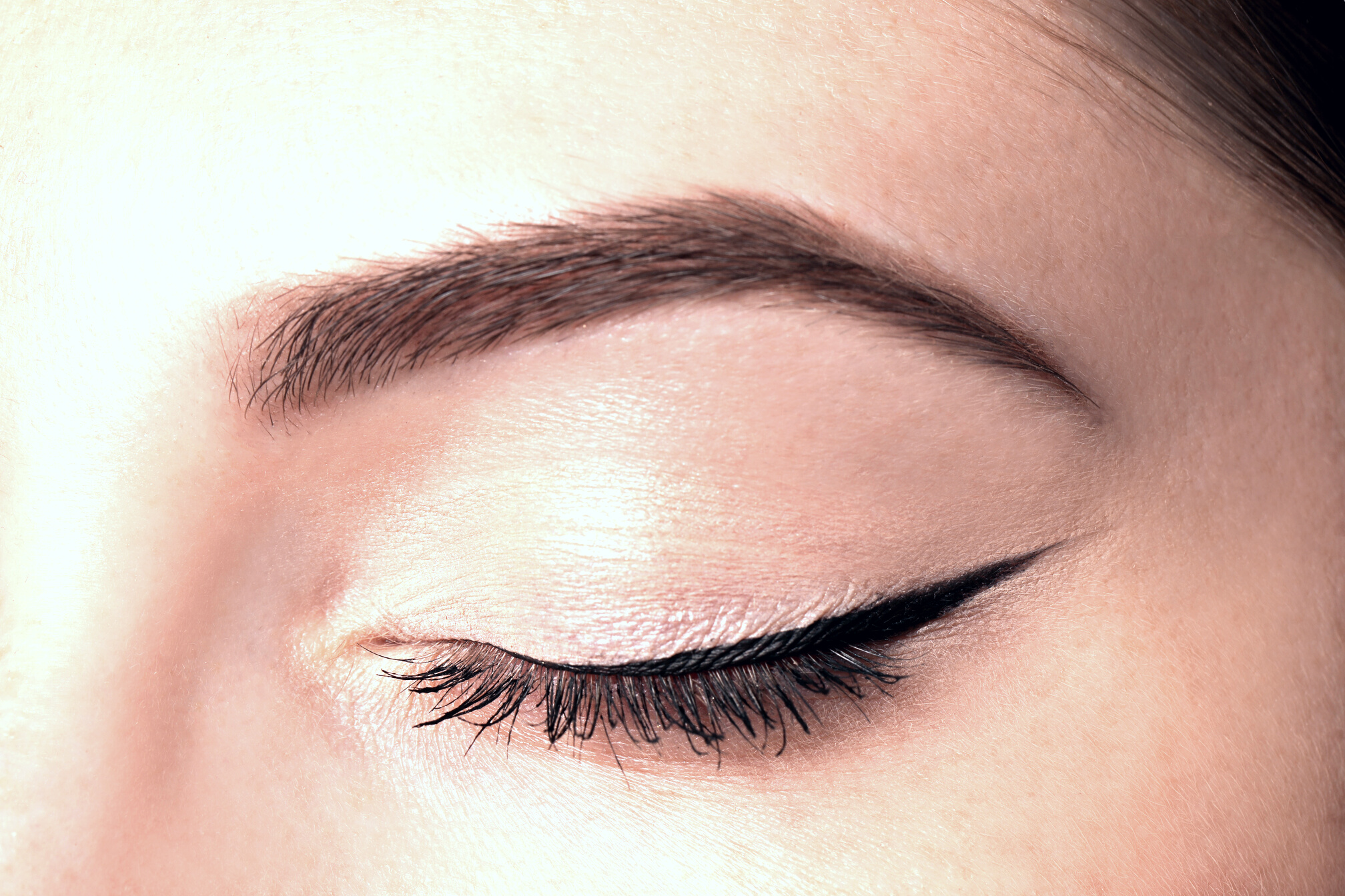 Beautiful Woman with Black Eyeliner, Closeup View